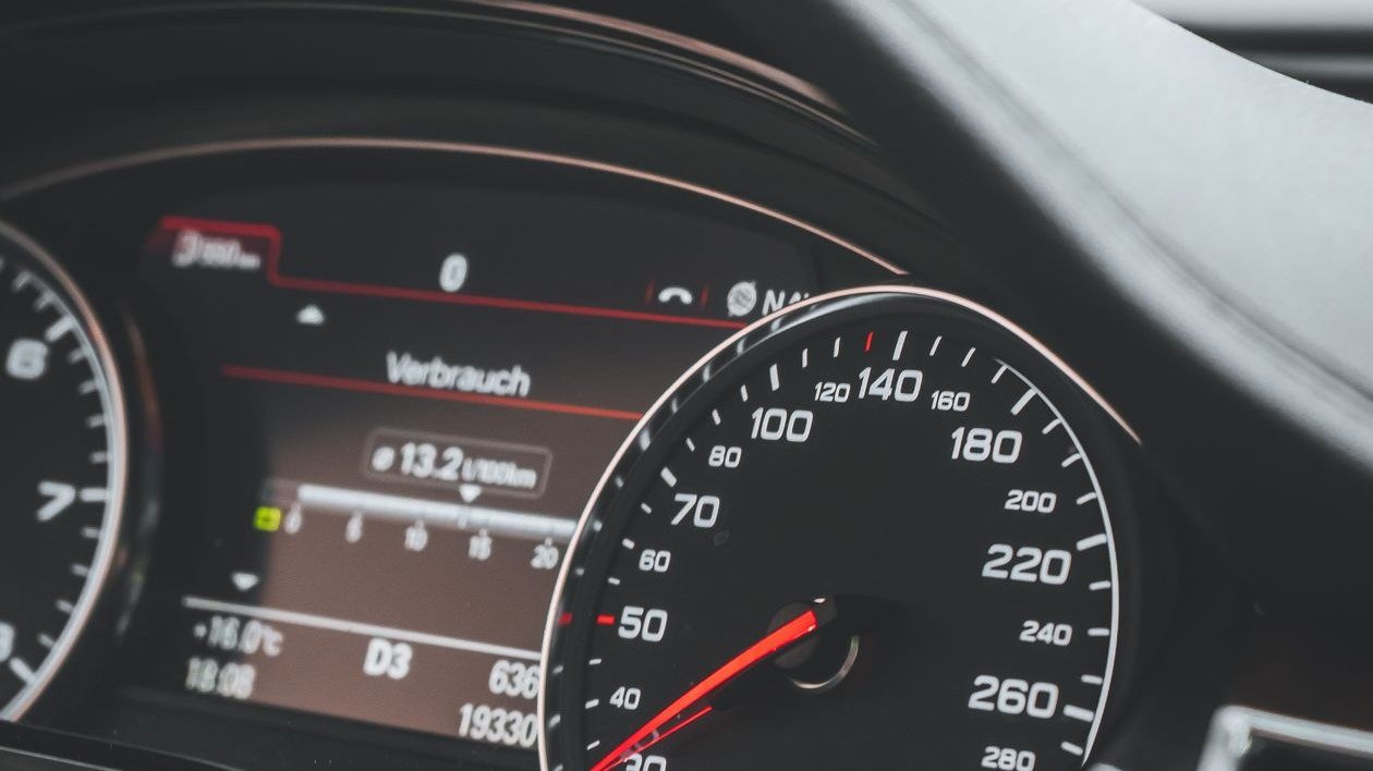Car dashboard and steering wheel close-up