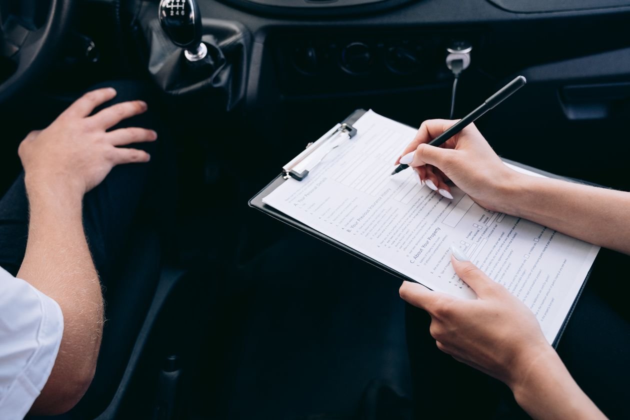 Vehicle documents and paperwork on a desk
