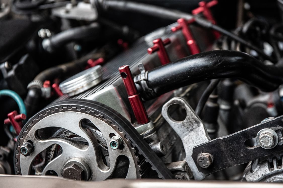 Car engine being inspected