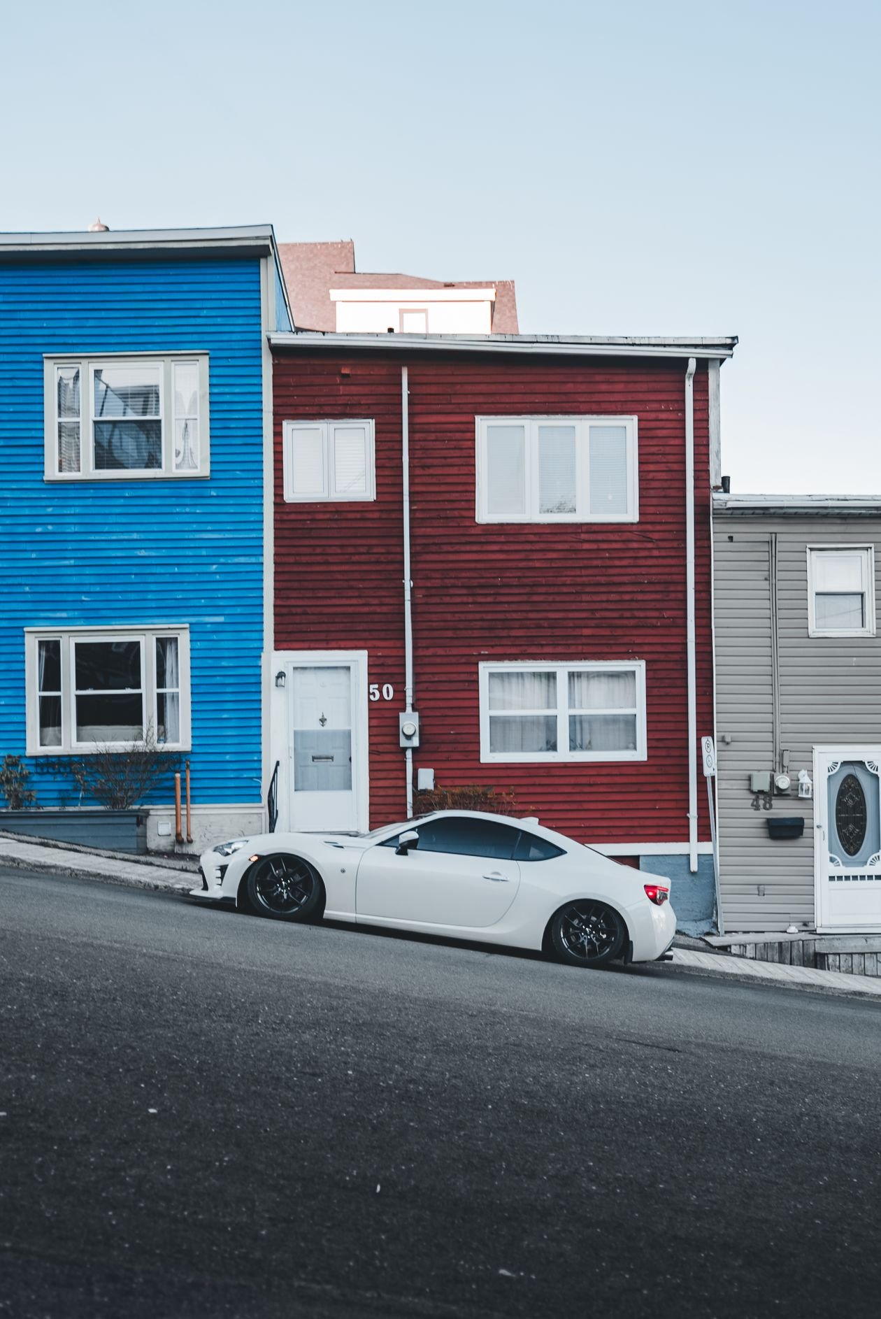 A car parked on a residential street