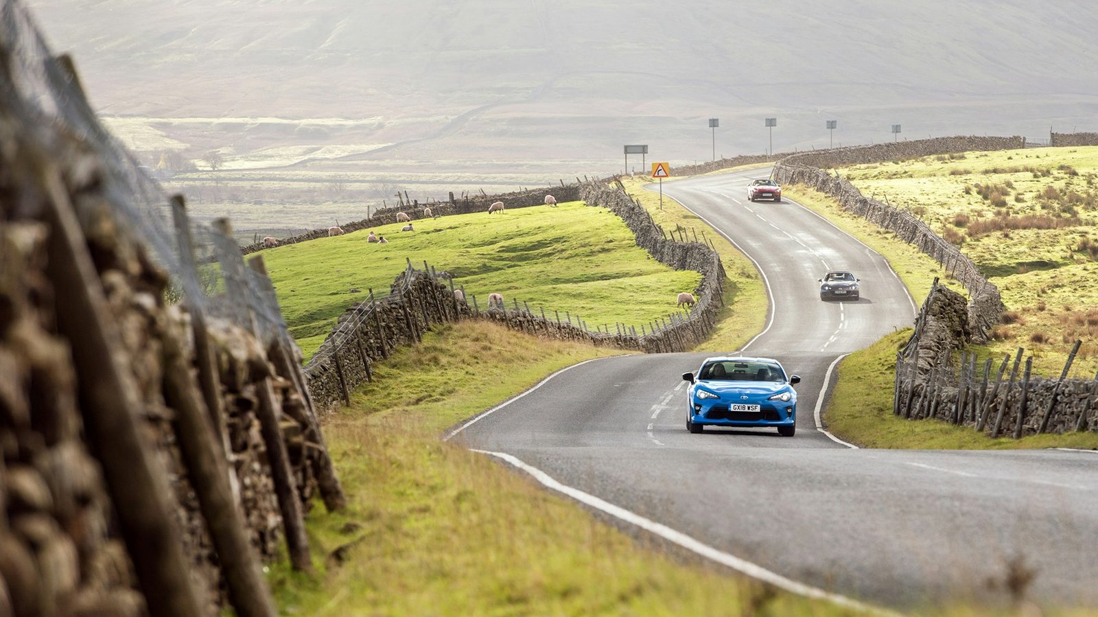 A car driving on the road in the UK